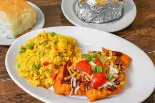 Taco with scrambled eggs and toppings